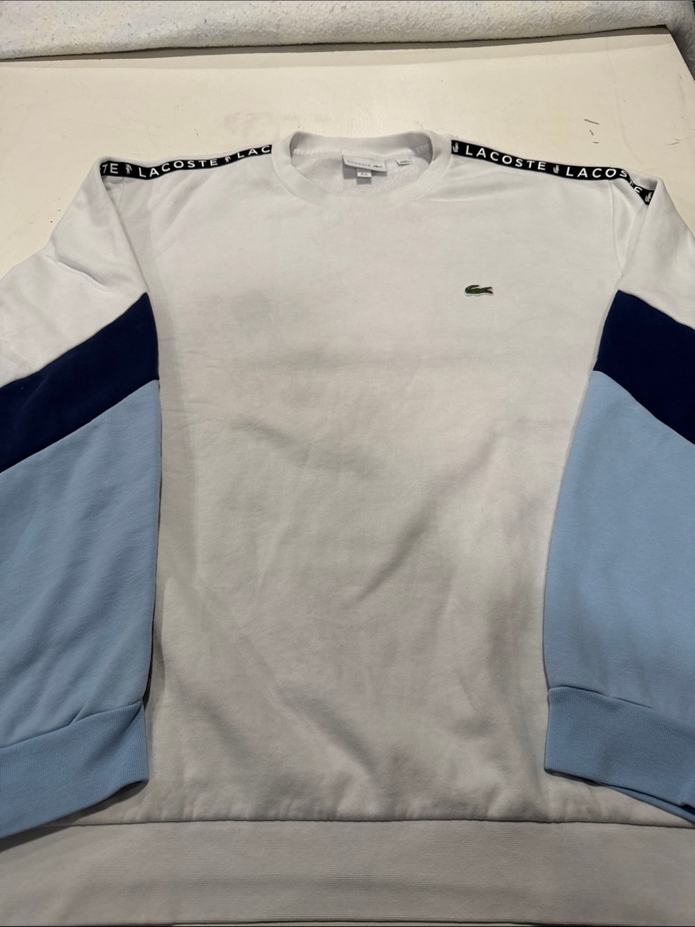 Lacoste White Crewneck with Light Blue and Navy Colorblock Sleeves